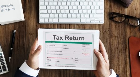 Income Tax Return Deduction Refund Concept
